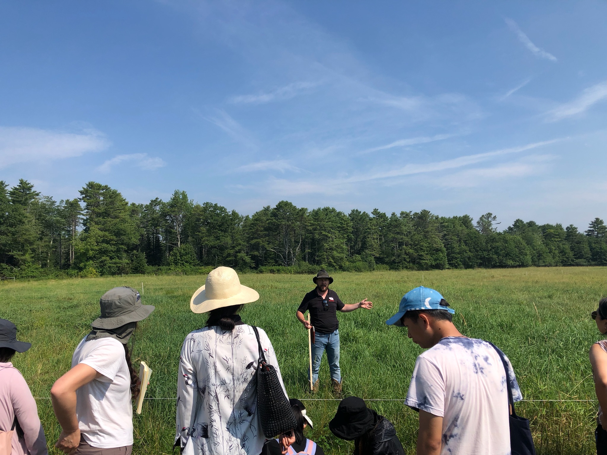 Farmer speaking to a group on a farm tour