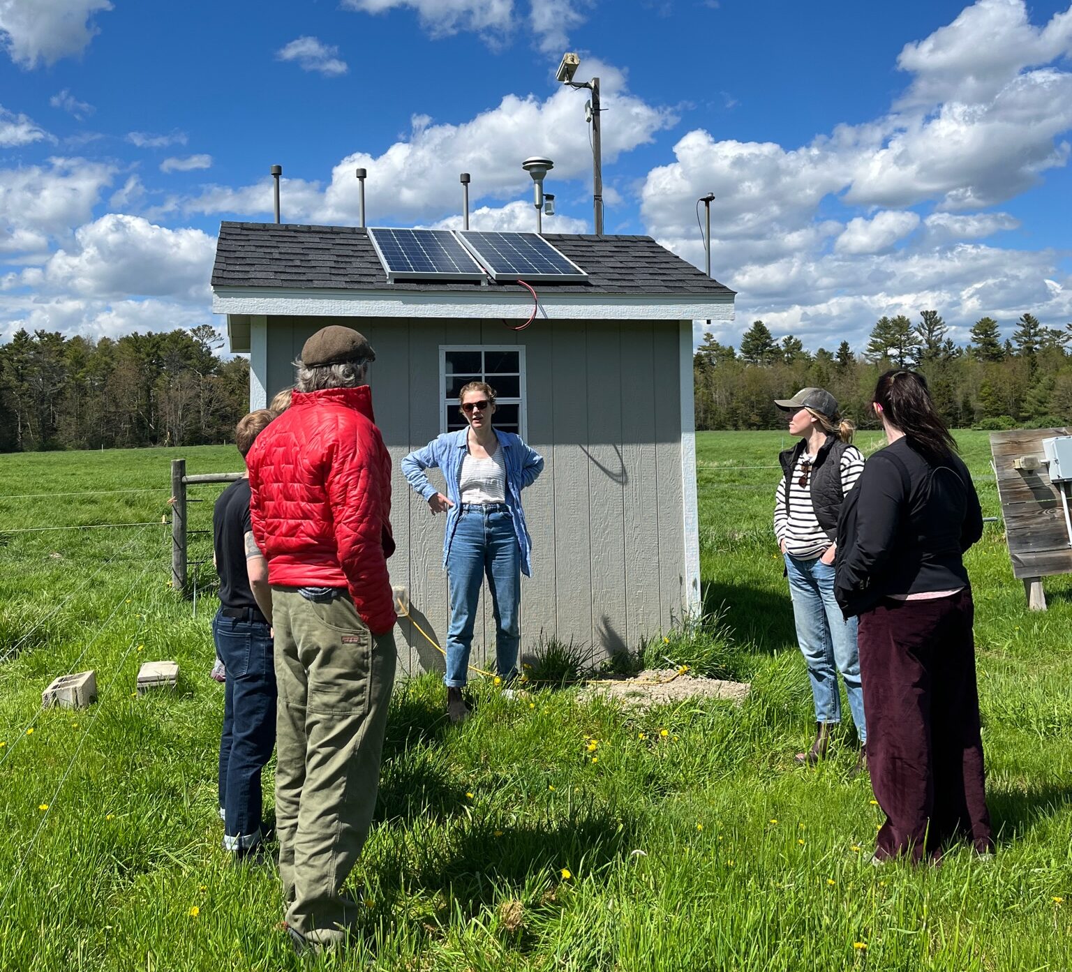 Farmer speaking to a group on a farm tour