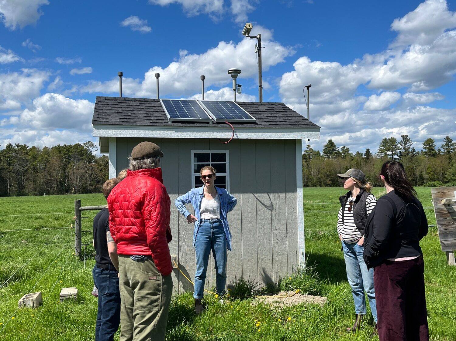 Farmer speaking to a group on a farm tour